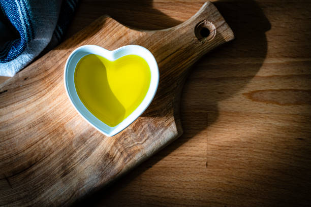 istock Extra virgin olive oil in a heart shaped bowl 2179950881