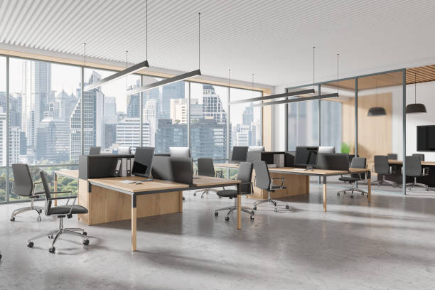 istock Stylish office interior with coworking and meeting zone, panoramic window 2179954931