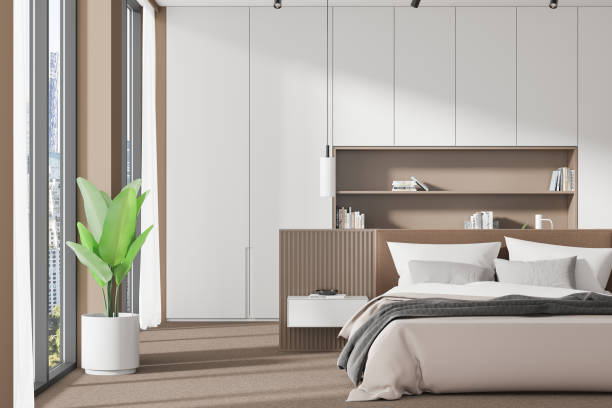 istock Stylish home bedroom interior with bed, accent wall and panoramic window 2179956103