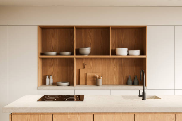 istock Contemporary kitchen with wooden cabinets, open shelving, and minimalistic design. Features a clean countertop with a sink and stovetop. 3D Rendering 2179956285