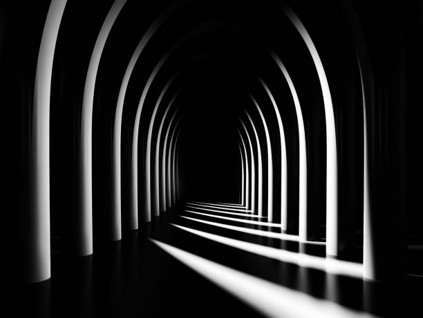 istock High-angle view of a outdoor area with some columns and a pathway, shadows casted on them. 2179956447