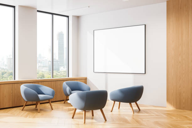 istock Modern office interior with blue chairs and blank poster on the wall. 3D Rendering 2179956817