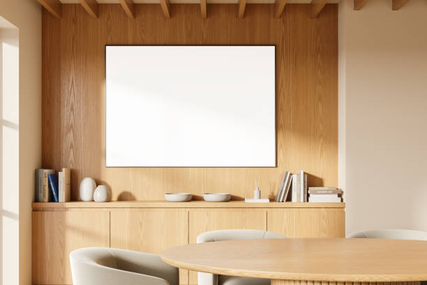 istock Blank poster mockup on wooden wall in cozy modern dining room. 3D Rendering 2179957367