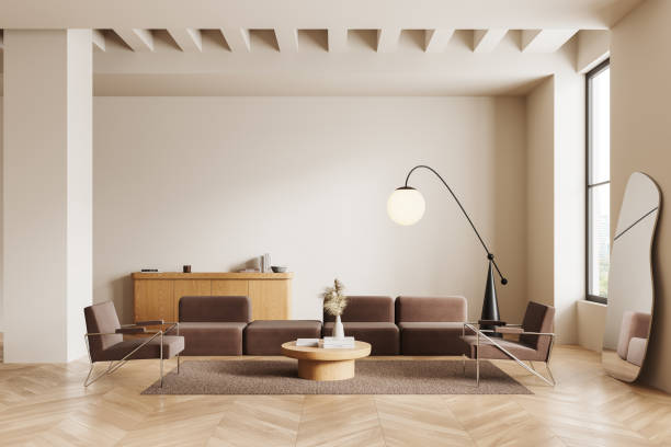 istock Beige home living room interior with two armchairs, sofa and panoramic window 2179957972