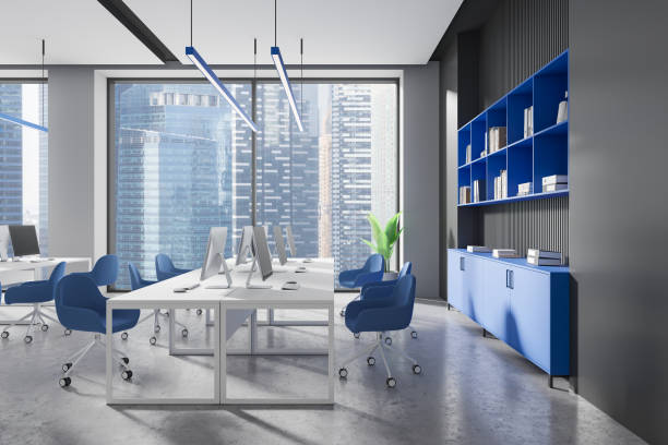 istock Modern office space with blue furniture and city view. 3D Rendering 2179958018