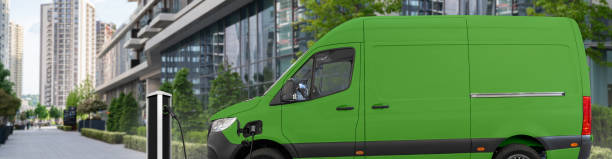 istock Electric delivery van with electric vehicles charging station. 2179958721