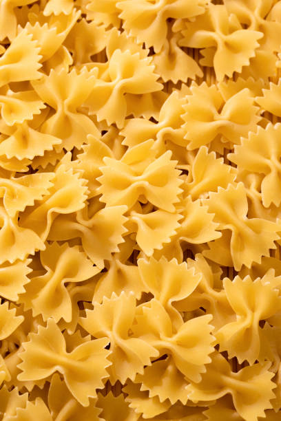 istock Dry farfalle pasta. Flour products close-up 2179960976
