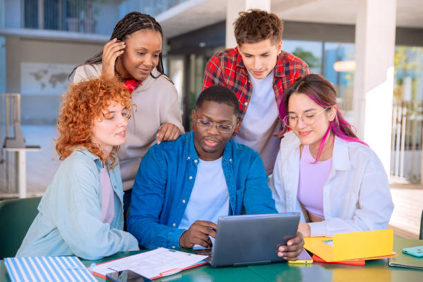 istock Group of students, prepare for university exams, use a laptop. 2179962481