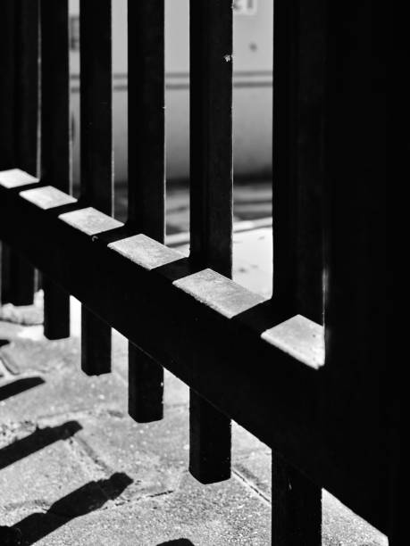 istock Lath structure in contrast light. Black and white photo of ceiling. 2179967026