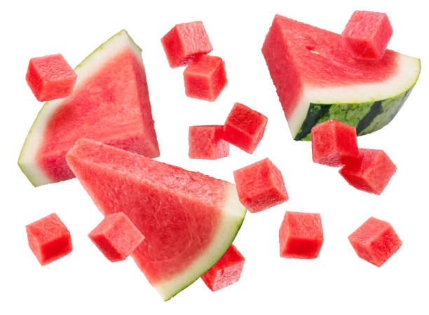istock Watermelon triangles  and watermelon cubes levitating in air on it isolated on white background. File contains clipping paths. 2179968036
