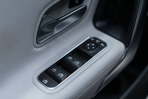 istock Interior Close-Up of Car Door and Window Controls 2179968785