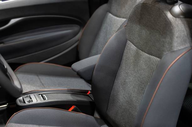 istock Inside front seats of a car, with clean, gray leather in a modern style 2179968873
