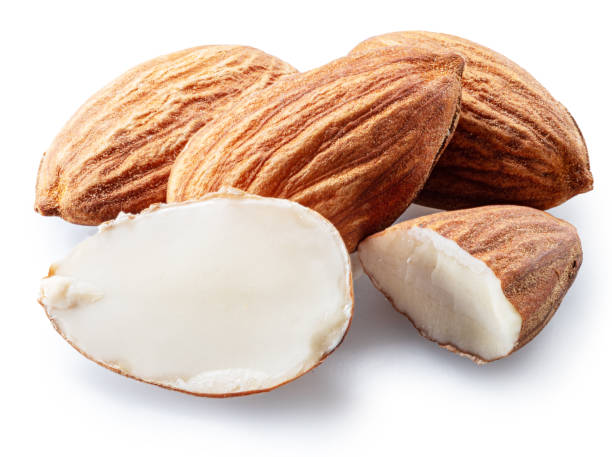 istock Almond nuts and split almonds isolated on white background. File contains clipping path. 2179969769