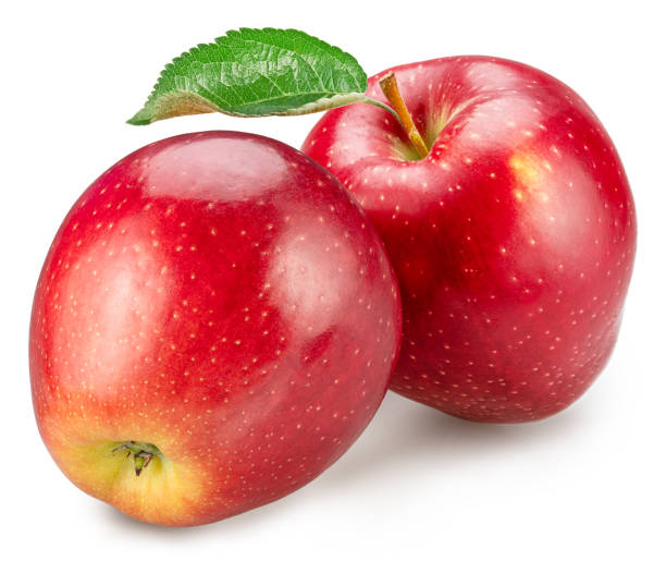 istock Ripe red apples with green apple leaves on white background. File contains clipping path. 2179969811