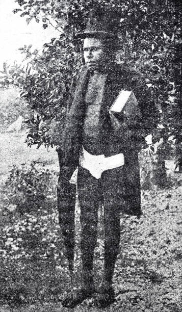 istock A black Christian missionary with the Bible under his arm standing outside 2179978284