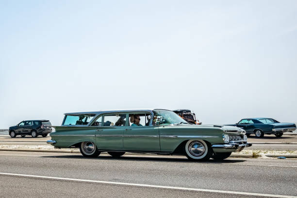 Gulfport, MS - October 04, 2023: Wide angle side view of a 1959 Chevrolet Parkwood Station Wagon at a local car show.