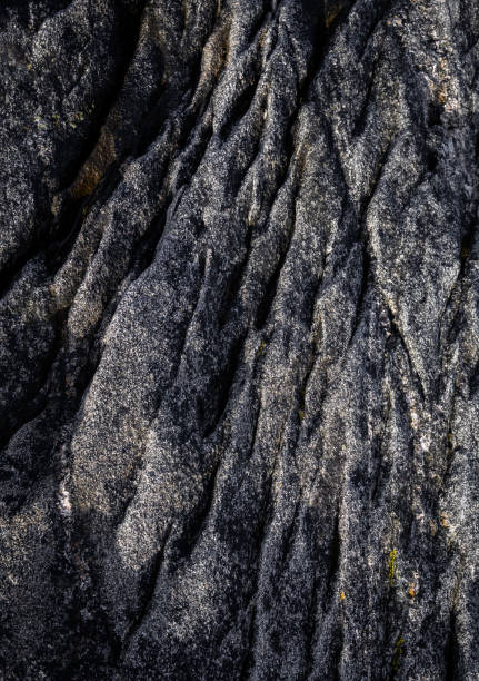 istock A beautiful textured rocks on the Tungeneset beach, Senja, Norway. 2179985314