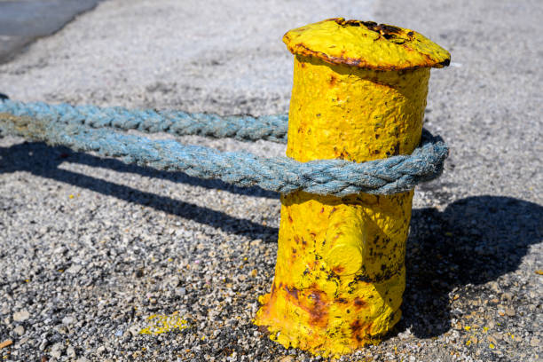 Rope tied around a yellow pole