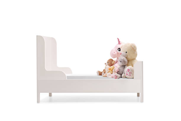 istock Plush toys on a kids bed 2179986963