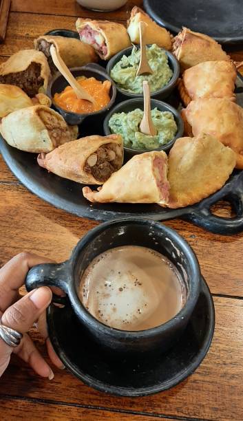 istock Cappuccino with various flavors of empanadas 2179989721