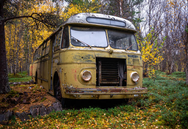 istock An old, abandoned, rusty buss left in the forest of Northern Norway. Magic bus. 2179990455