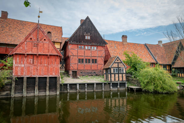 istock Historic Danish Timber-Framed Houses by Tranquil River in aalborg denmark 2179994371
