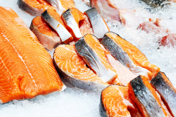 istock Red fish meat on ice in the store 2179999115