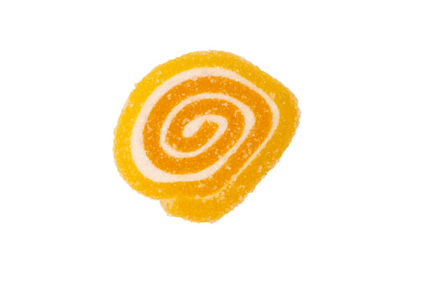 Jelly sweet candy roll isolated on a white background. Marmalade candy.
