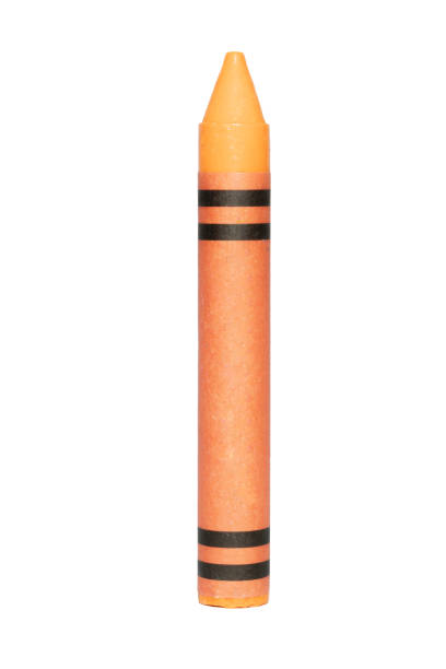istock Orange crayon with black lines on white background: creative tool for children and adults. 2180001371