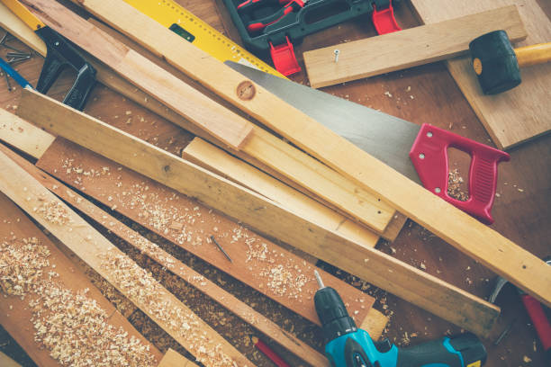 istock DIY craftsperson wood heap carpenter objects woodwork handyman desk. Architect tools with ruler measure hammer home improvement equipments. Wooden builder carpenter repairing construction workshop 2180002725