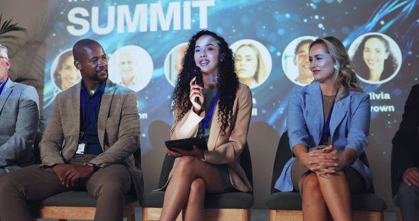 istock Conference, event and keynote speaker with business people and technology for networking, industry panel and summit. Convention, stage and ai ethics with seminar for audience, showcase or news 2180004881