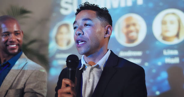 istock Stage, seminar and keynote speaker with business people and technology for networking, industry panel and summit. Hackathon, conference and ai ethics with speech for audience, event showcase and news 2180004882