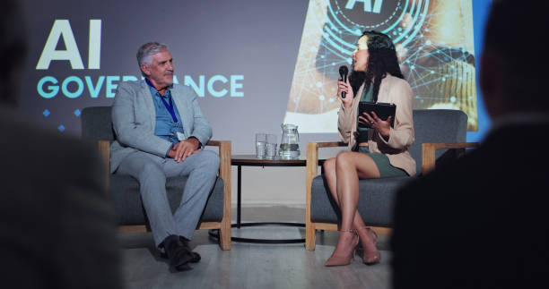 istock Ai, ethics and interview with business people at seminar for networking, industry panel and keynote speaker. Summit, conference and technology with speech for audience, event showcase and news 2180004970