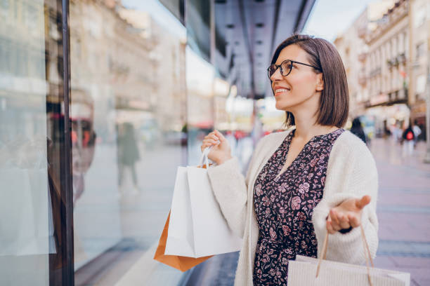 istock Woman enjoying in shopping 2180012605