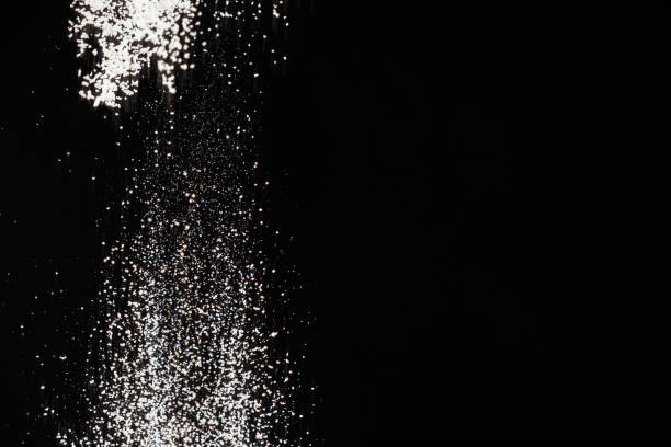 istock Abstract black and white background of pouring flour, space for text 2180012797