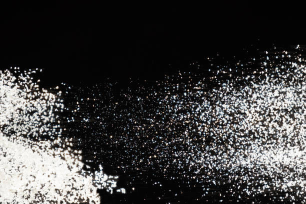 istock Abstract black and white background of pouring flour, space for text 2180012814