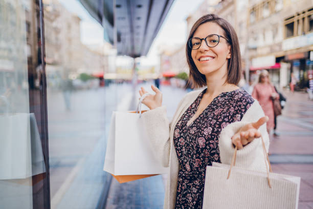 istock Woman enjoying in shopping 2180013955