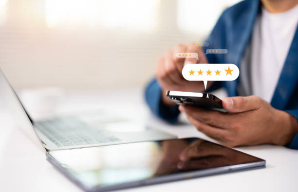 istock User give rating to service experience on online application, Customer can evaluate quality of service leading to reputation ranking of business. Customer review satisfaction feedback survey concept. 2180019298