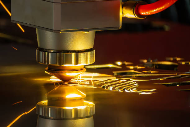 Close up scene the fiber laser cutting machine cut the stainless steel. Close up scene the fiber laser cutting machine cut the stainless steel. The hi-technology sheet metal manufacturing process by laser cutting machine. laser cutting metal stock pictures, royalty-free photos & images