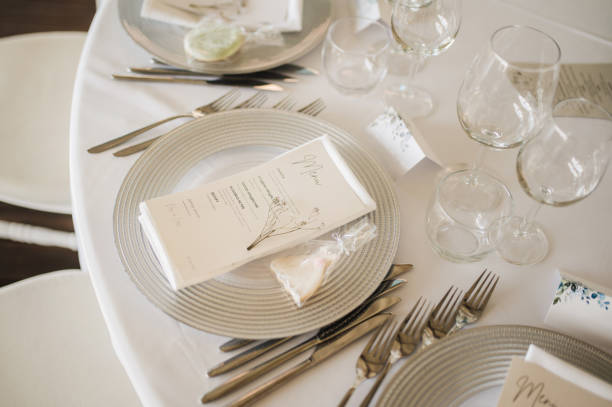 istock Table setting for an event party or wedding reception. Fresh flower table decoration 2180024286