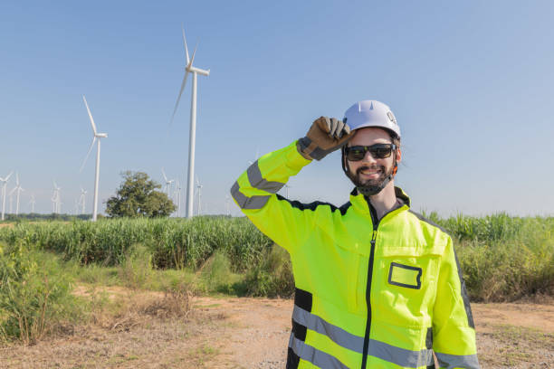 istock Portrait of engineer pose at wind turbines field 2180025127