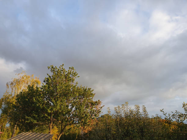 Rain clouds over the village, on an autumn day, nature