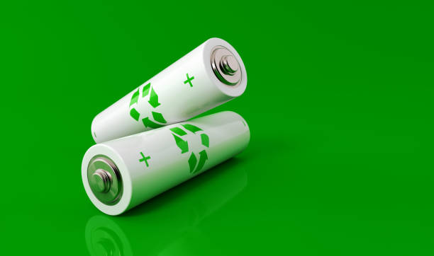 istock White Colored Batteries With Recycling Symbol On Green Background 2180031400