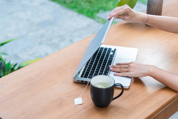 istock Outdoor Workspace with Laptop and Beverage 2180034115