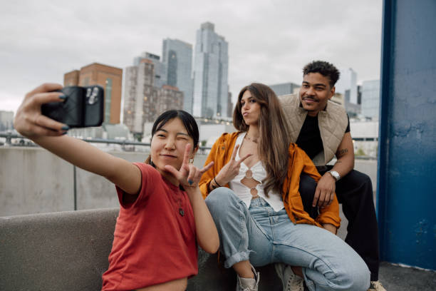 istock Three happy friends spending time together 2180039159