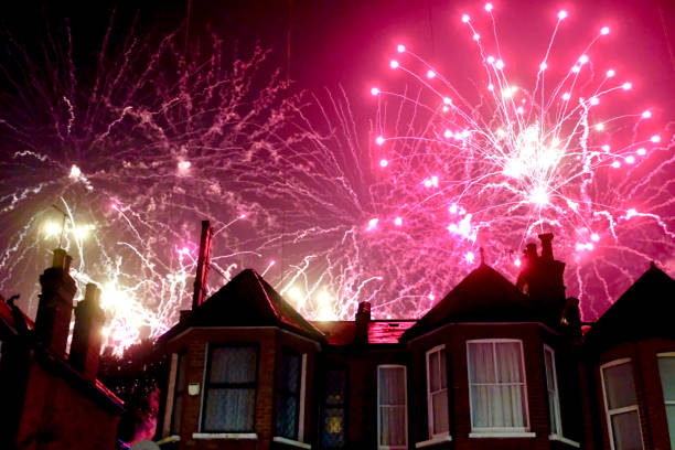 London, UK.  November 4th 2023.  Fireworks celebrating the traditional British Guy Fawkes bonfire night of 5th November exploding above a row of houses in a suburb of north London.