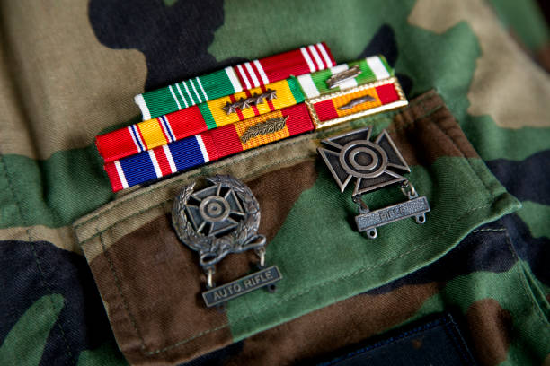 Close up of American soldiers award ribbons on jacket.