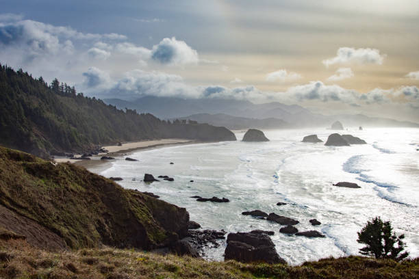 istock Dramatic clouds and waves on Cannon Beach in north Oregon 2180050942