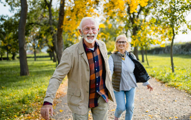 istock Joyful senior couple at the park 2180055744