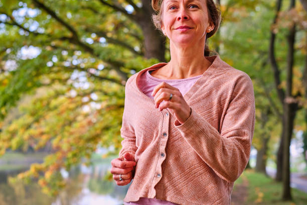 istock Morning Jog by the Riverside 2180057293